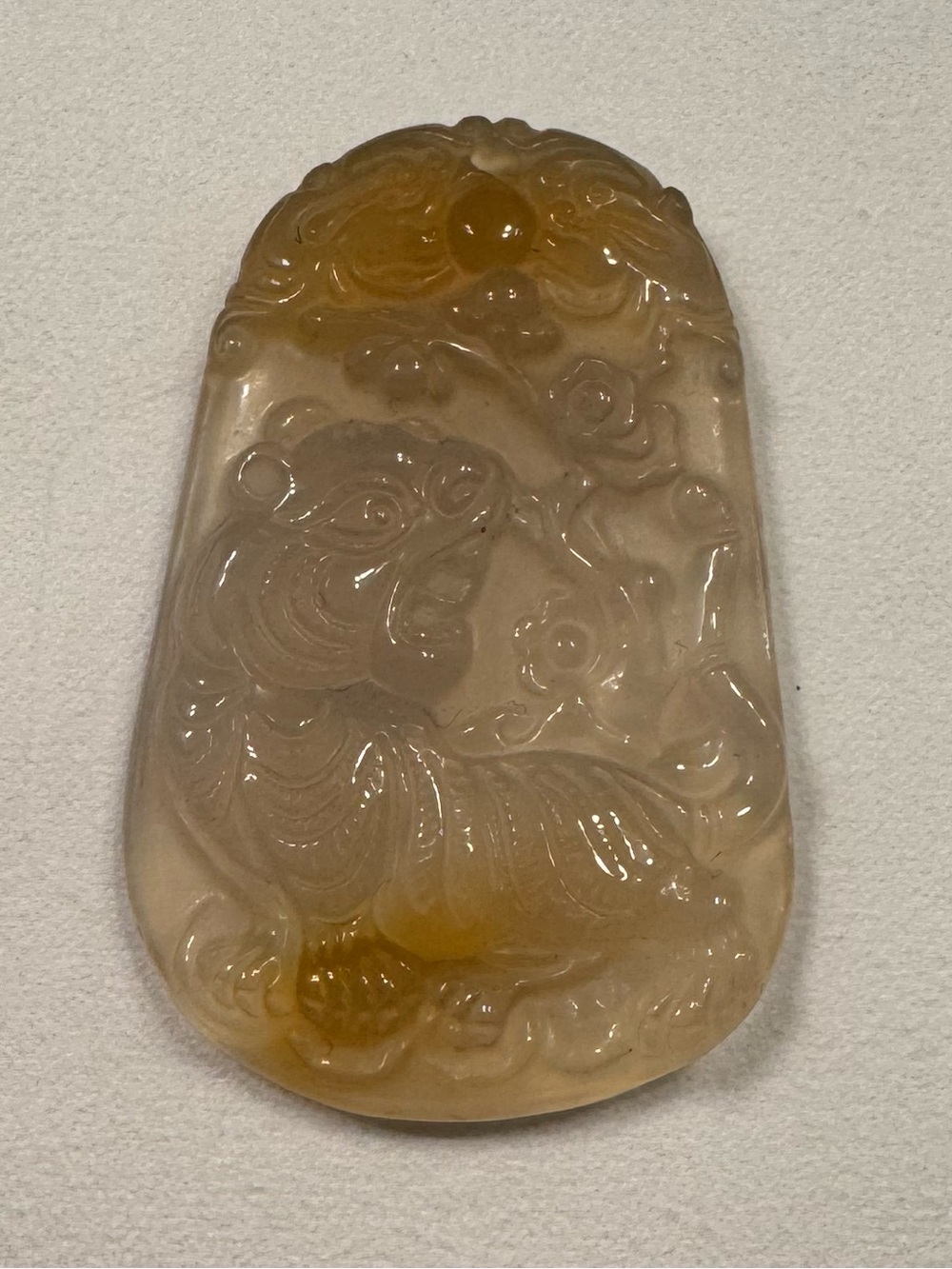Carved Jade Tiger Pendant in Translucent Warm Honey Tone